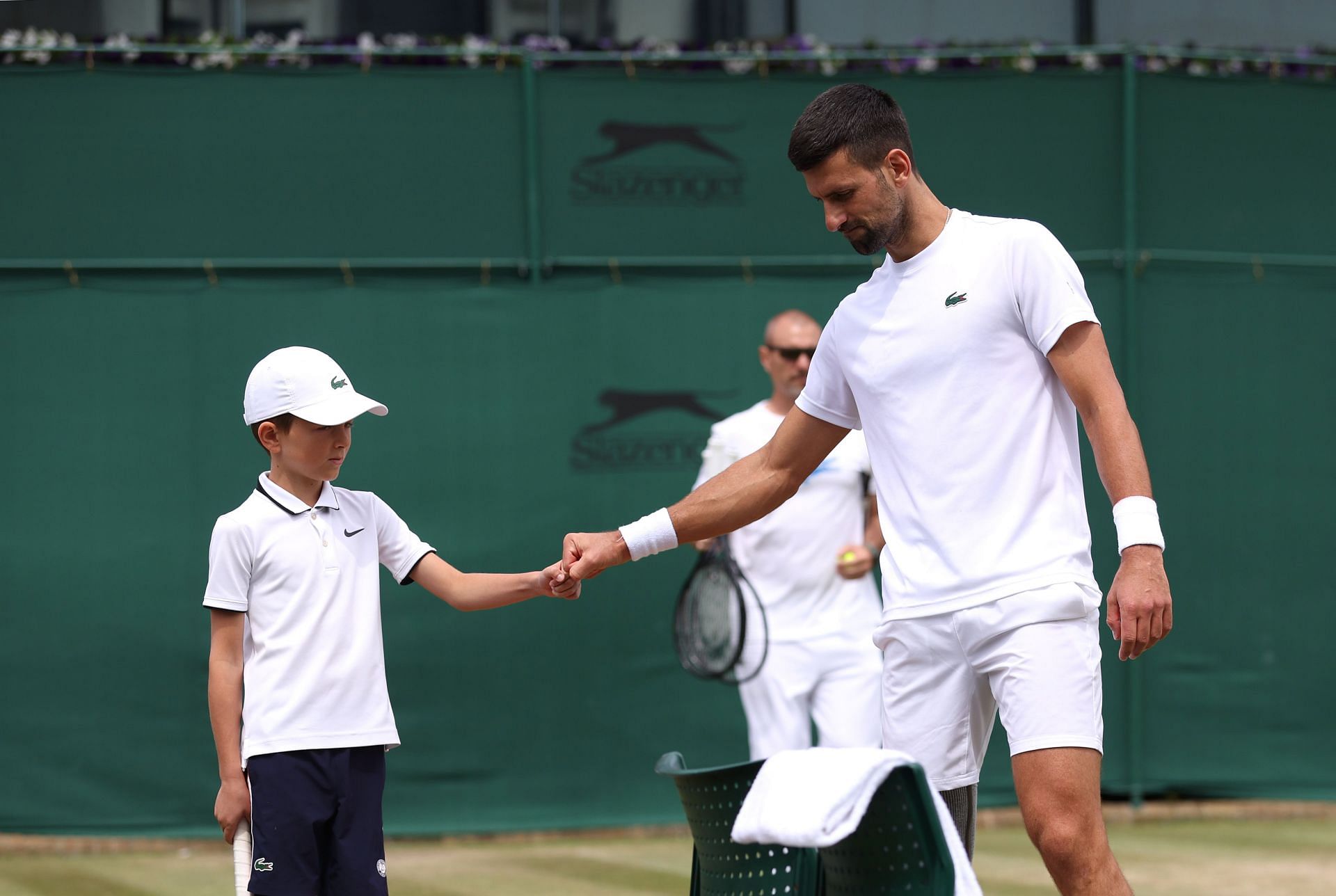 Djokovic and his son Stefan at The Championships - Wimbledon - Source: Getty